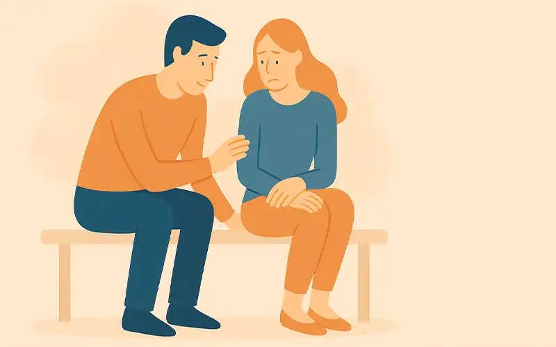 Couple sitting on a bench illustrating anxious-avoidant dynamic